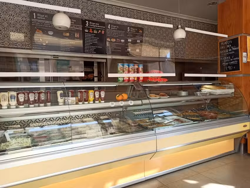 Asados Juan XXIII. Comida para llevar