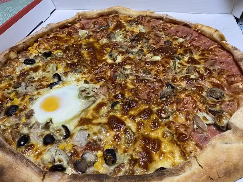 Polleria Pizzer&iacute;a Ortiz